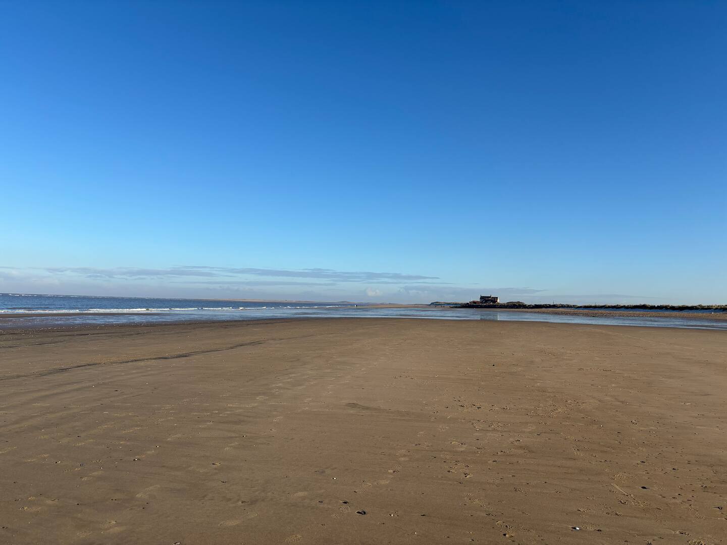 People enjoying a sunny day at the beach